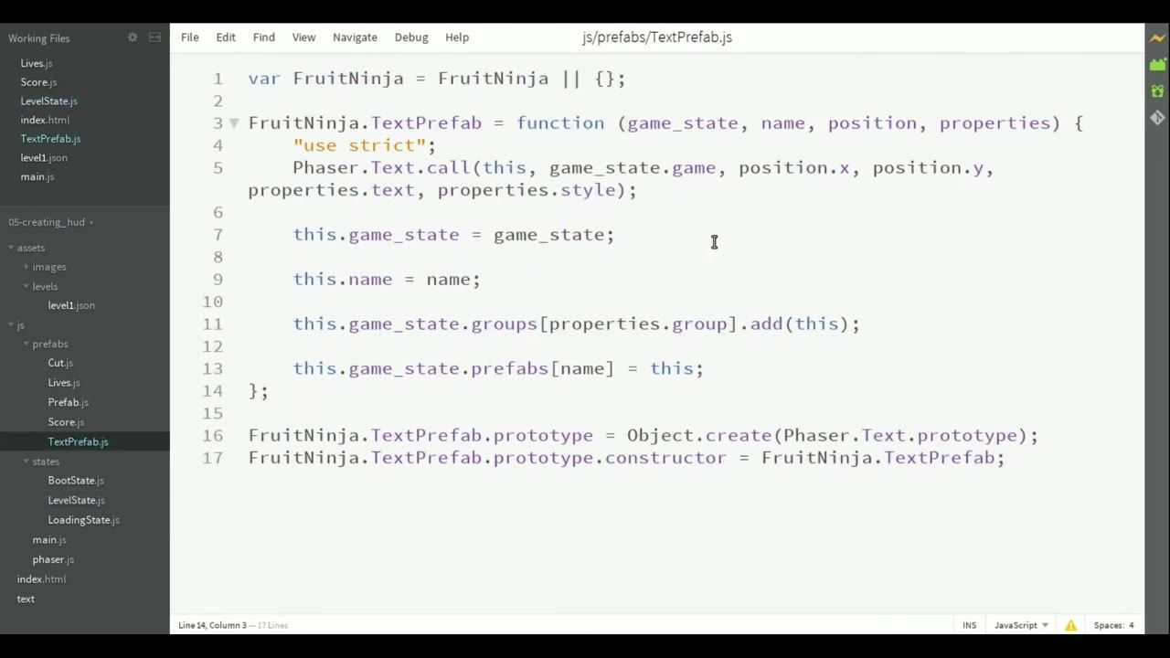 A code editor is open to js/prefabs/TextPrefab.js, showing a TextPrefab constructor and prototype assignment.