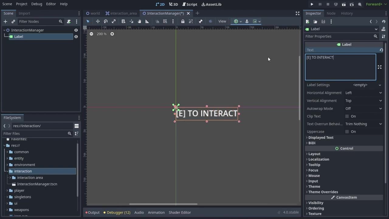Godot editor with the InteractionManager scene open and a Label node selected, showing the label text in the 2D viewport and the Inspector on the right.